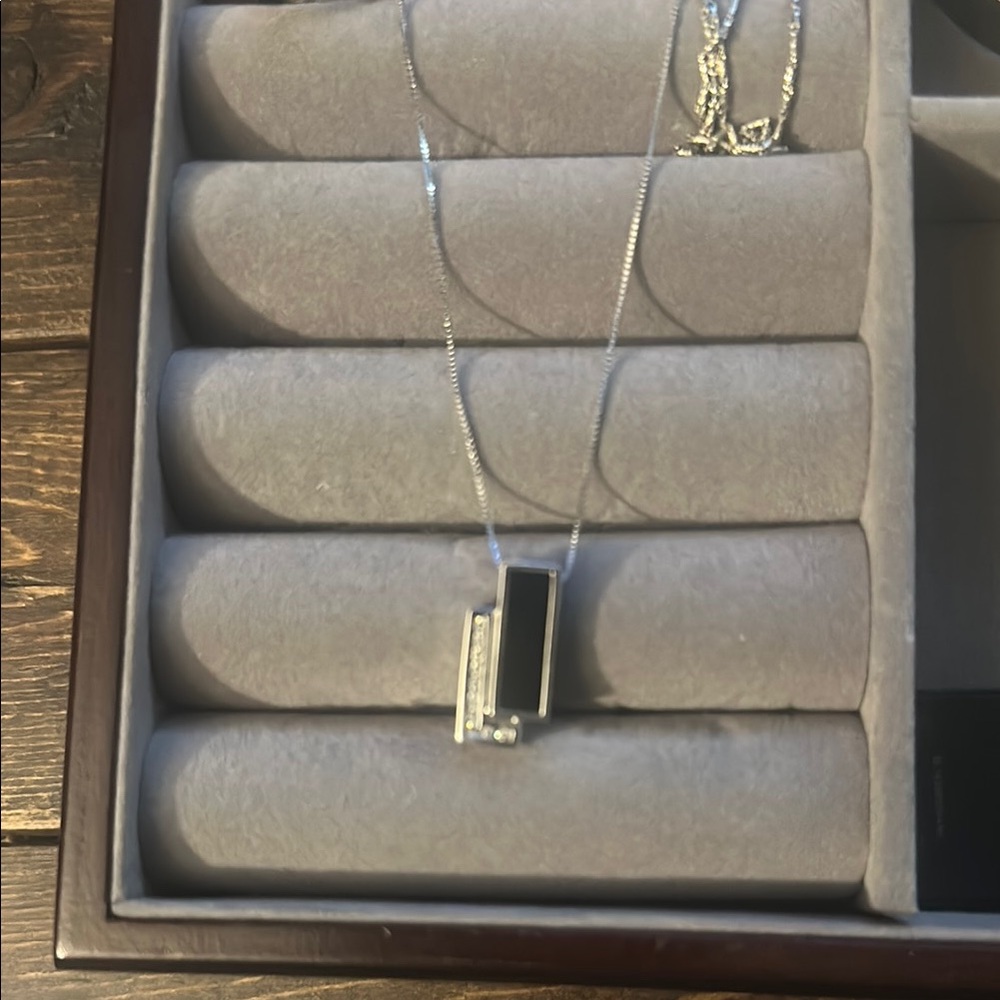 Elegant Silver and Black Necklace with Diamond accents
